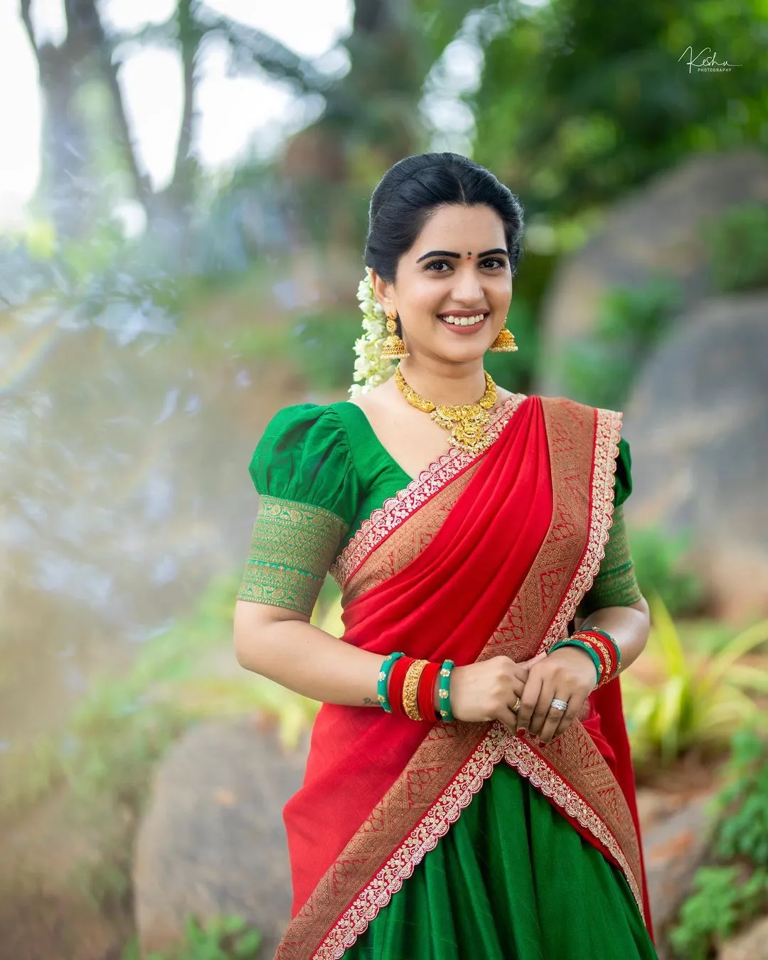 TELUGU TV ACTRESS SRAVANTHI CHOKARAPU STILLS IN GREEN LEHENGA CHOLI 6